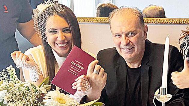 Burak Sergen  and Nihan Unsal wearing back and white dresses